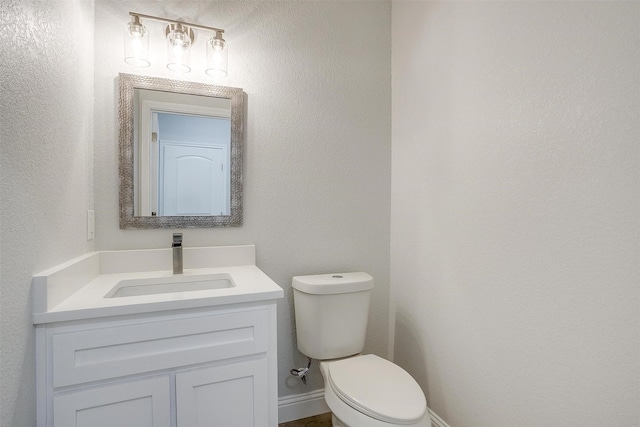 507 S 4th St, Grandview, TX 76050 - half bath featuring vanity and toilet