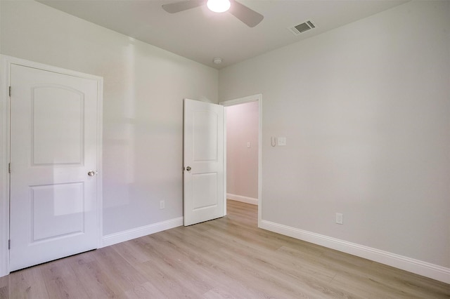 507 S 4th St, Grandview, TX 76050 - unfurnished bedroom featuring light wood-style floors and a ceiling fan