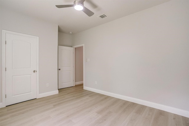 507 S 4th St, Grandview, TX 76050 - unfurnished bedroom featuring light wood-style flooring and a ceiling fan