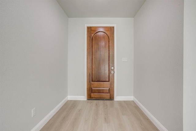 507 S 4th St, Grandview, TX 76050 - doorway with light wood-style floors and baseboards