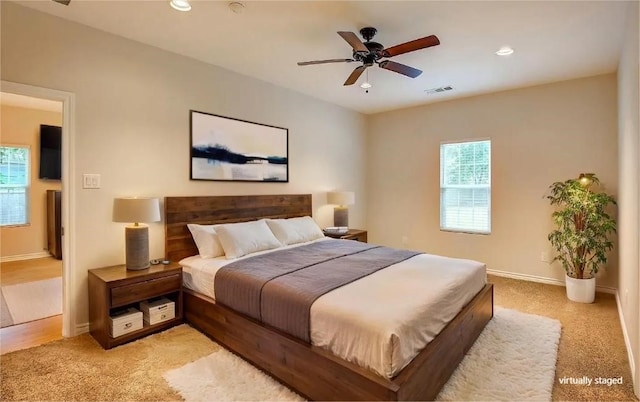 109 W Damon St, Terrell, TX 75160 - bedroom featuring multiple windows, light carpet, recessed lighting, and a ceiling fan