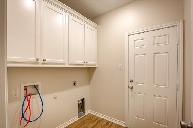 109 W Damon St, Terrell, TX 75160 - laundry room with cabinet space, electric dryer hookup, washer hookup, gas dryer hookup, and light wood-style flooring