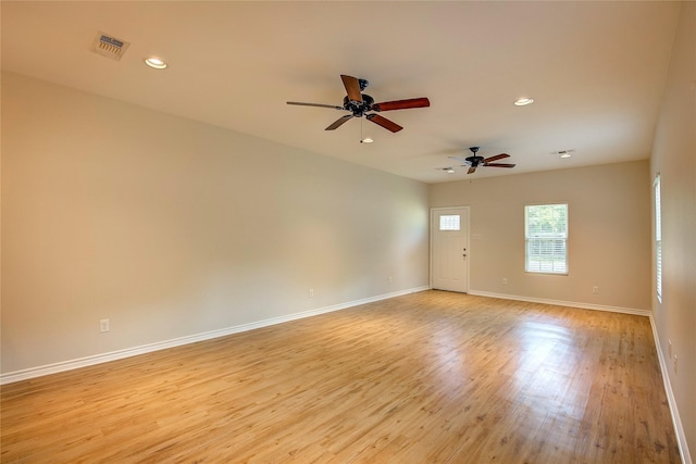 109 W Damon St, Terrell, TX 75160 - spare room featuring light wood-style floors, ceiling fan, and recessed lighting