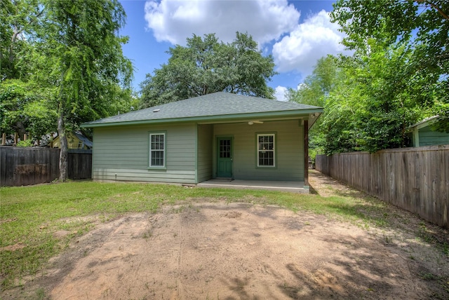 109 W Damon St, Terrell, TX 75160 - rear view of property featuring a fenced backyard, a patio area, and roof with shingles