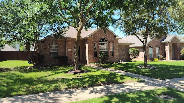 11521 Blanchard Dr, Frisco, TX 75035 - view of front facade featuring brick siding