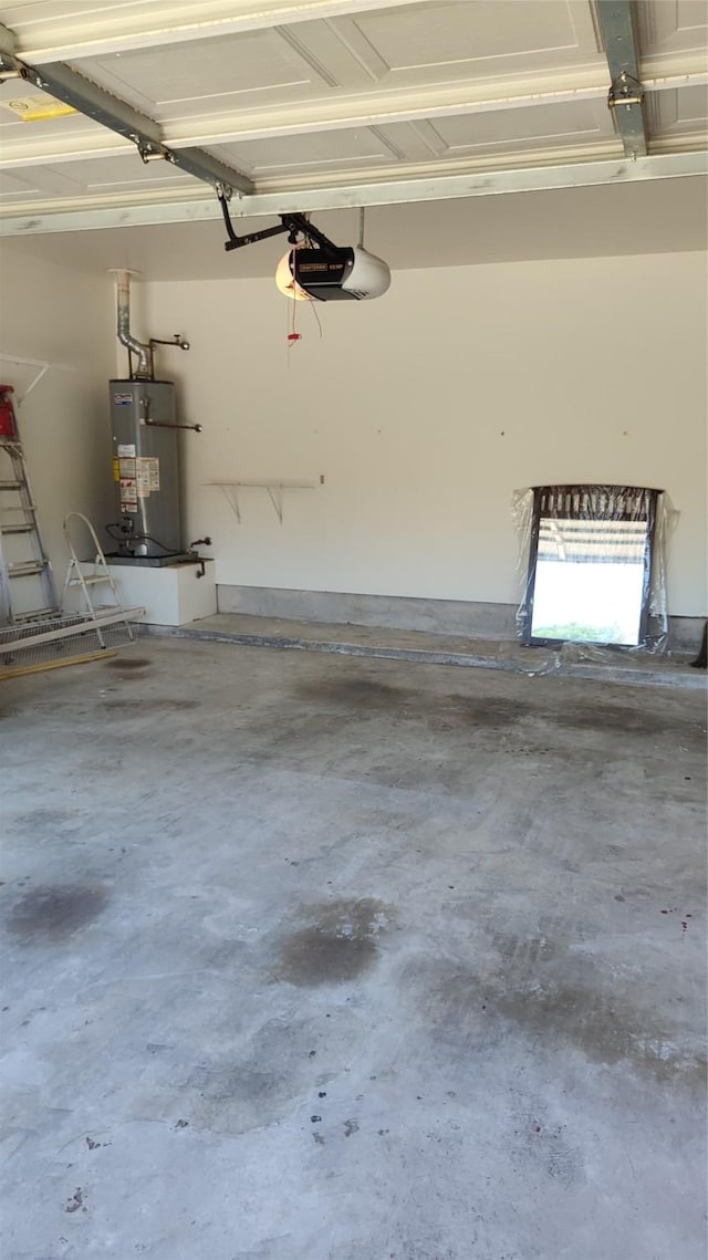 11521 Blanchard Dr, Frisco, TX 75035 - garage with gas water heater and a garage door opener