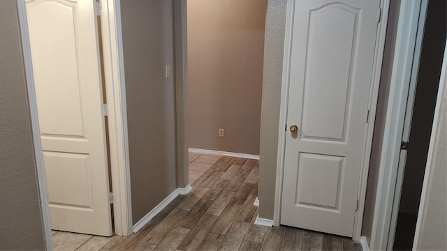 11521 Blanchard Dr, Frisco, TX 75035 - hall featuring light wood-style flooring and baseboards