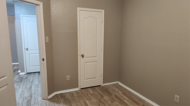 11521 Blanchard Dr, Frisco, TX 75035 - empty room with wood finished floors