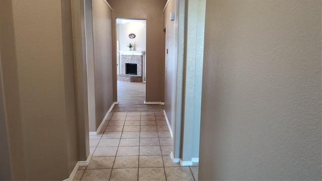 11521 Blanchard Dr, Frisco, TX 75035 - corridor featuring a textured wall and light tile patterned floors