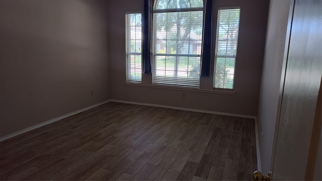 11521 Blanchard Dr, Frisco, TX 75035 - spare room with dark wood finished floors and baseboards