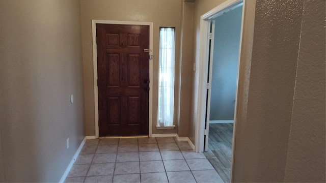 11521 Blanchard Dr, Frisco, TX 75035 - entrance foyer with light tile patterned flooring and baseboards