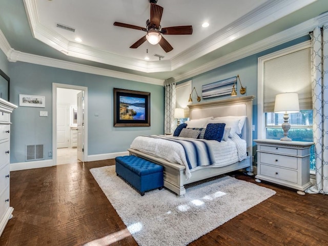 1908 Peninsula Dr, Flower Mound, TX 75022 - bedroom with wood finished floors, a raised ceiling, crown molding, a ceiling fan, and connected bathroom