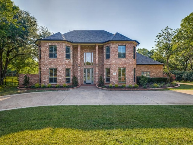 1908 Peninsula Dr, Flower Mound, TX 75022 - view of front of property with brick siding