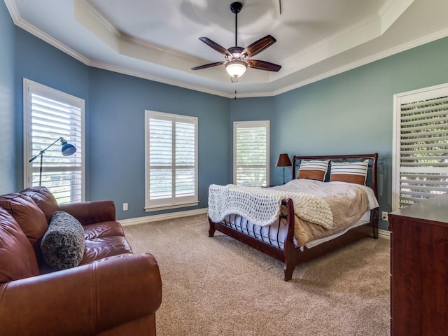 1908 Peninsula Dr, Flower Mound, TX 75022 - bedroom featuring a raised ceiling, carpet flooring, crown molding, and a ceiling fan