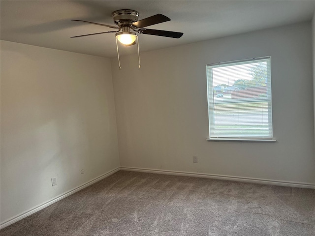 5729 Pearce St, The Colony, TX 75056 - spare room featuring carpet floors and a ceiling fan
