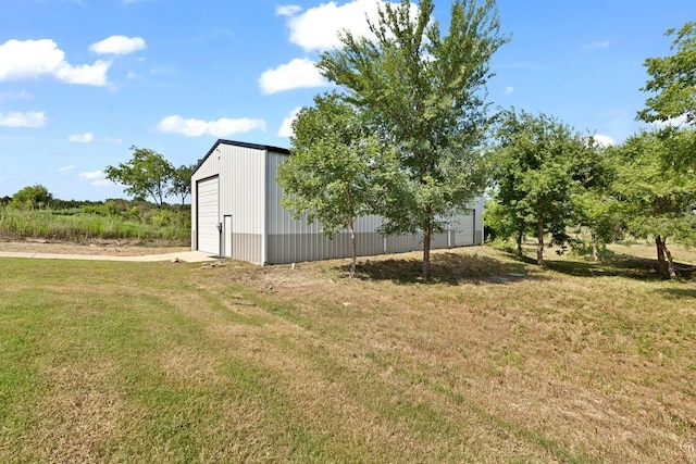 3036 Deer Ct, Weatherford, TX 76085 - view of grassy yard with a garage and an outbuilding