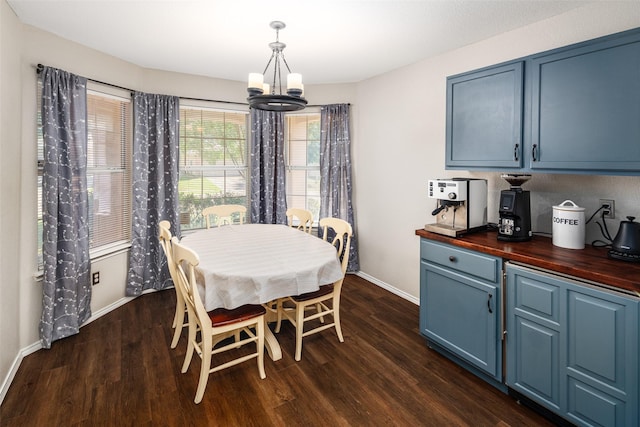 1722 Chestnut St, Anna, TX 75409 - dining area featuring a chandelier and dark wood finished floors
