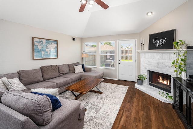 1722 Chestnut St, Anna, TX 75409 - living area with vaulted ceiling, wood finished floors, a brick fireplace, a ceiling fan, and recessed lighting
