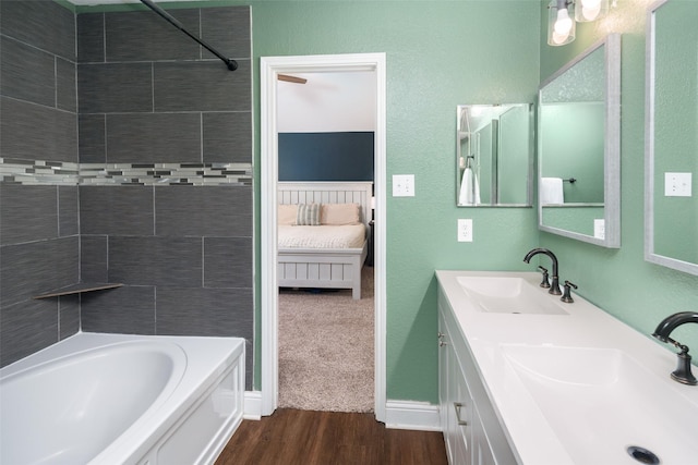 1722 Chestnut St, Anna, TX 75409 - full bathroom with wood finished floors, double vanity, connected bathroom, and shower / bathtub combination