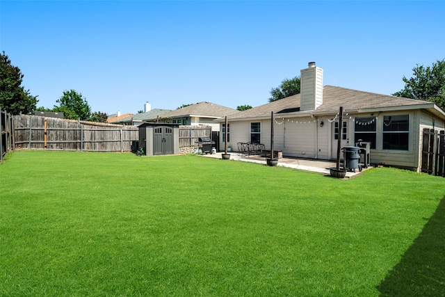 1722 Chestnut St, Anna, TX 75409 - fenced backyard with a storage shed and a patio
