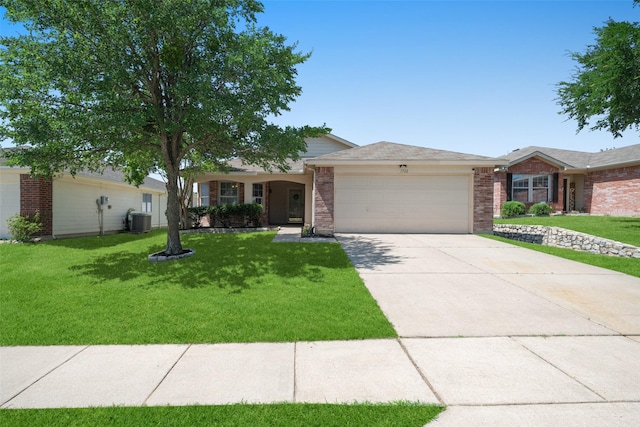 1722 Chestnut St, Anna, TX 75409 - single story home with an attached garage, a front lawn, brick siding, and driveway