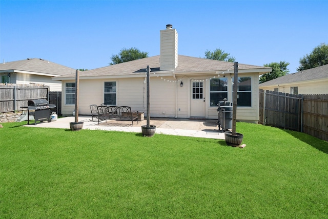 1722 Chestnut St, Anna, TX 75409 - rear view of property with a patio area, a fenced backyard, and a chimney