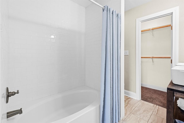 411 Harcourt St, Weatherford, TX 76086 - full bath with shower / bath combination with curtain and a walk in closet