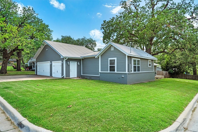 411 Harcourt St, Weatherford, TX 76086 - single story home with a garage, driveway, a metal roof, and brick siding