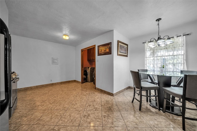 6354 Cinnamon Oaks, Dallas, TX 75241 - dining area featuring a chandelier, washer and dryer, and a textured ceiling
