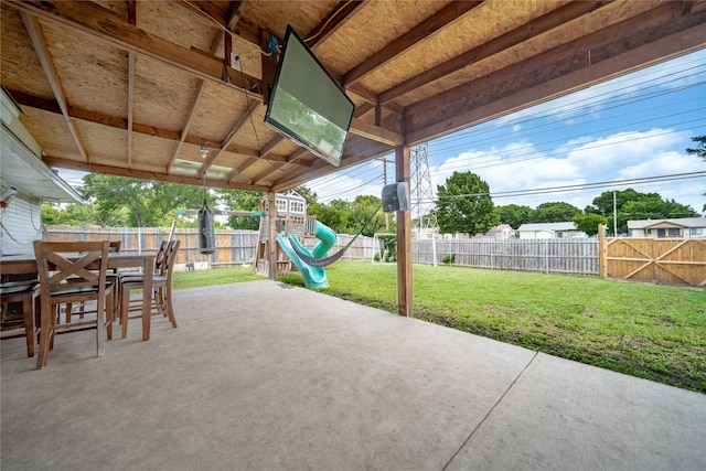 6354 Cinnamon Oaks, Dallas, TX 75241 - fenced backyard with a patio area, a playground, and outdoor dining space