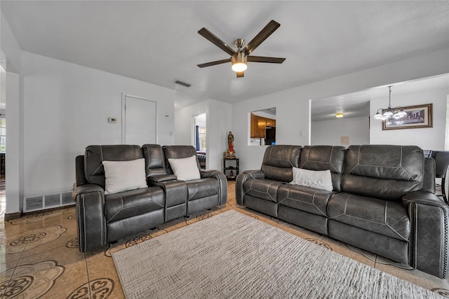 6354 Cinnamon Oaks, Dallas, TX 75241 - tiled living room featuring a ceiling fan, plenty of natural light, and a chandelier