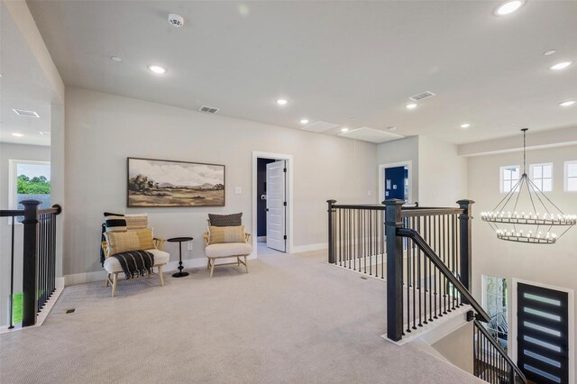 233 Kirkpatrick Ct, Argyle, TX 76226 - living area with an upstairs landing, carpet, recessed lighting, a chandelier, and healthy amount of natural light