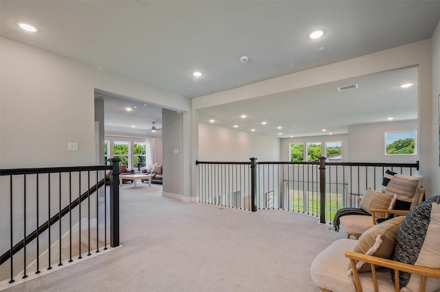 233 Kirkpatrick Ct, Argyle, TX 76226 - sitting room featuring light carpet, recessed lighting, and an upstairs landing
