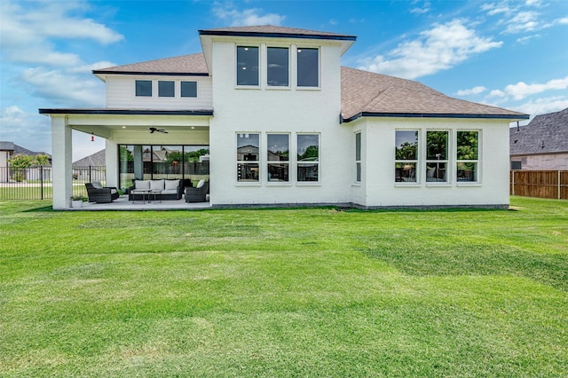 233 Kirkpatrick Ct, Argyle, TX 76226 - rear view of house with an outdoor hangout area, roof with shingles, a fenced backyard, ceiling fan, and a patio area