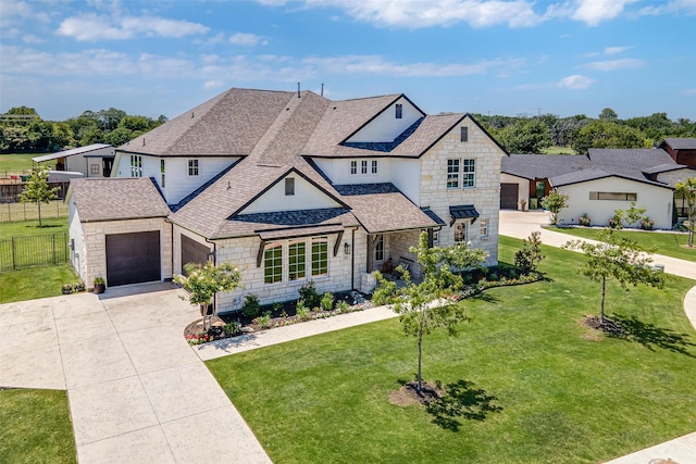 233 Kirkpatrick Ct, Argyle, TX 76226 - french country inspired facade featuring driveway, roof with shingles, stone siding, and an attached garage