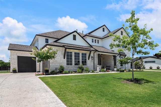 233 Kirkpatrick Ct, Argyle, TX 76226 - view of front facade with stone siding, concrete driveway, an attached garage, a front lawn, and roof with shingles