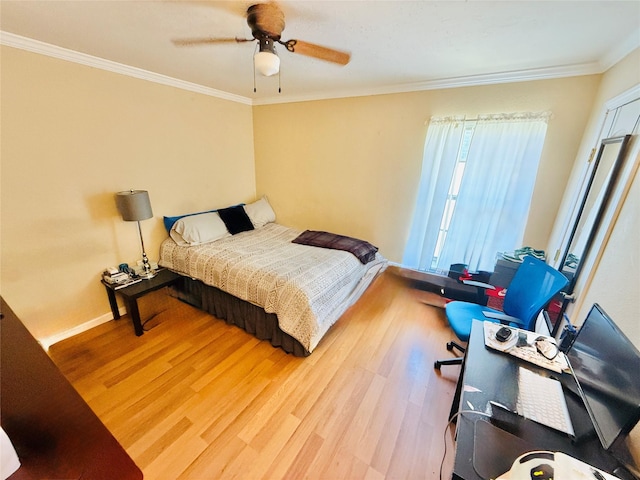 380 NE 32nd St, Paris, TX 75460 - bedroom with wood finished floors, crown molding, and a ceiling fan