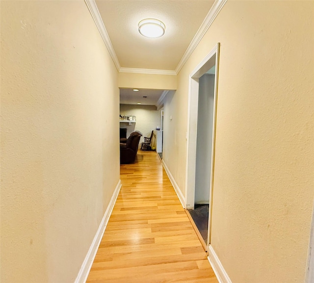 380 NE 32nd St, Paris, TX 75460 - hallway featuring light wood finished floors and crown molding