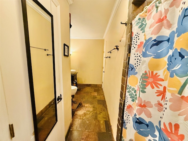 380 NE 32nd St, Paris, TX 75460 - full bathroom with stone tile flooring, ornamental molding, and a shower with shower curtain