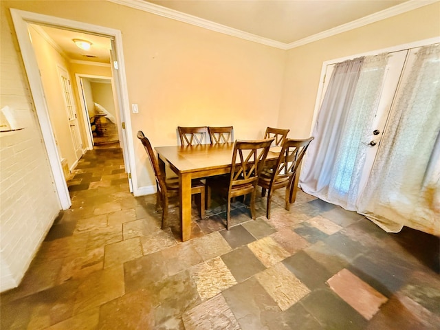 380 NE 32nd St, Paris, TX 75460 - dining area with stone tile flooring and crown molding