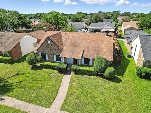 1708 Hutchinson St, Mesquite, TX 75150 - view of front of home with a residential view, a front lawn, and roof with shingles