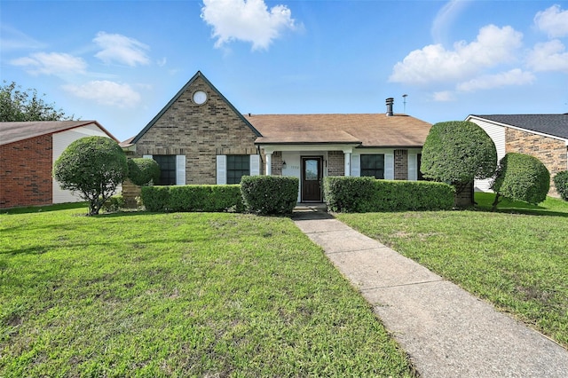 1708 Hutchinson St, Mesquite, TX 75150 - view of front of house featuring brick siding and a front yard