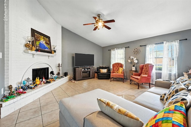 1708 Hutchinson St, Mesquite, TX 75150 - living room featuring light tile patterned floors, a brick fireplace, vaulted ceiling, and a ceiling fan