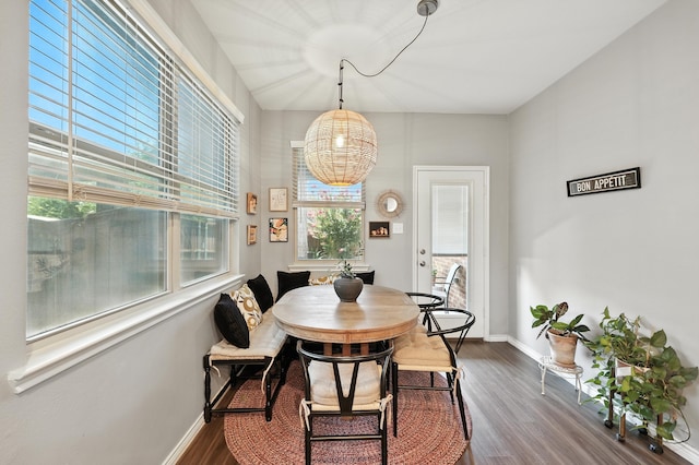 2136 Miramar Dr, Little Elm, TX 75068 - dining area with dark wood-style flooring and a chandelier