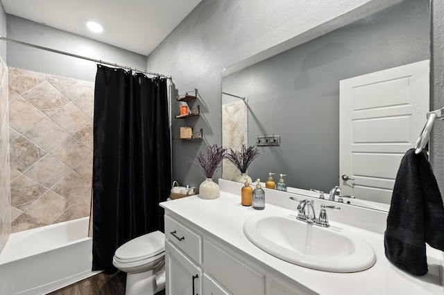 2136 Miramar Dr, Little Elm, TX 75068 - full bath with vanity, shower / bath combo, wood finished floors, and a textured wall