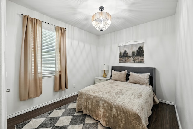 2136 Miramar Dr, Little Elm, TX 75068 - bedroom with wood finished floors and baseboards