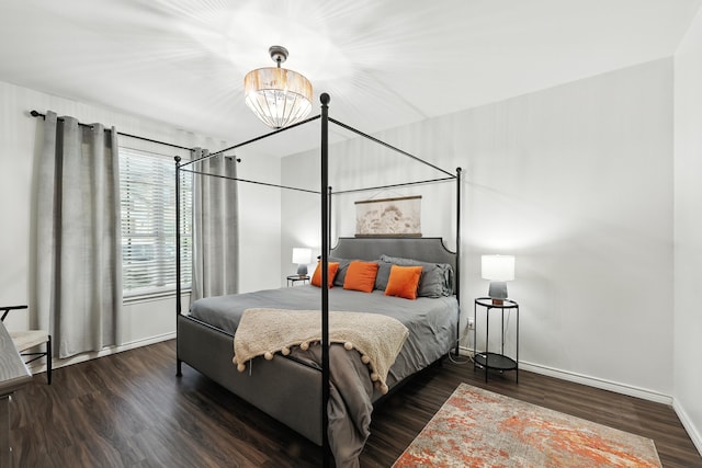 2136 Miramar Dr, Little Elm, TX 75068 - bedroom with a chandelier and wood finished floors