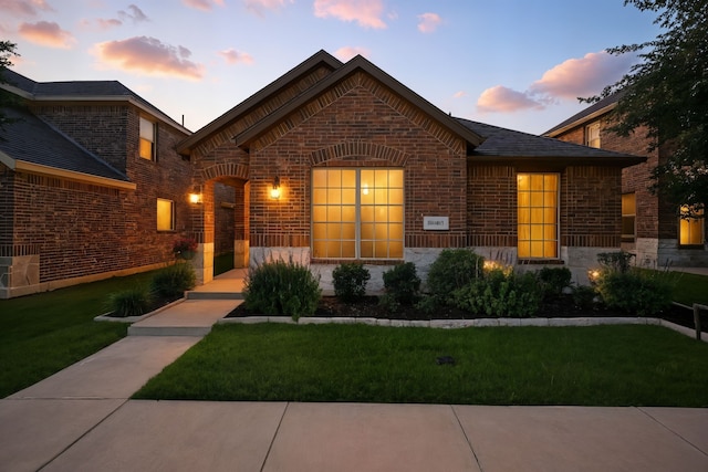 2136 Miramar Dr, Little Elm, TX 75068 - view of front of property featuring brick siding, a front lawn, and stone siding