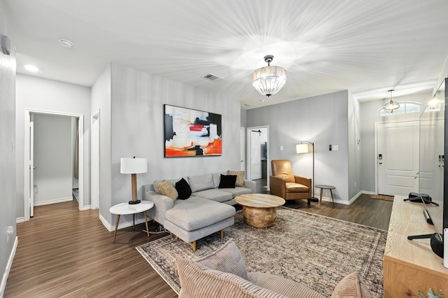 2136 Miramar Dr, Little Elm, TX 75068 - living area with wood finished floors, a chandelier, and recessed lighting