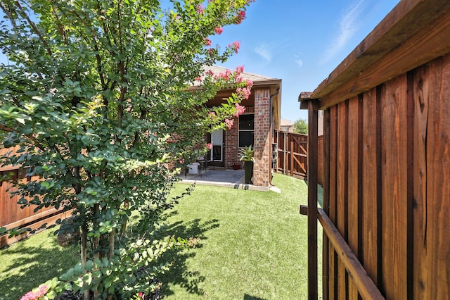 2136 Miramar Dr, Little Elm, TX 75068 - fenced backyard with a patio area
